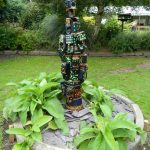 A totem style sculpture at Bridge Inn